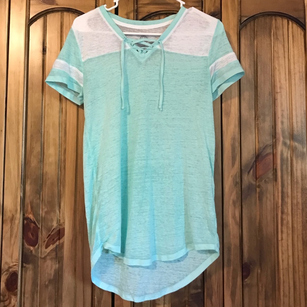 So juniors teal varsity tee size M.